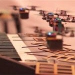 Nano quadrotors play Bond theme song
