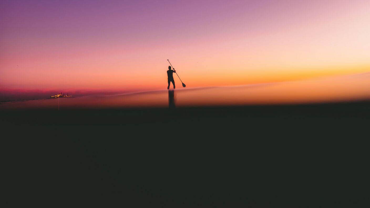 Exponential Medicine healthcare hacks stand paddle surfing ocean beautiful colorful