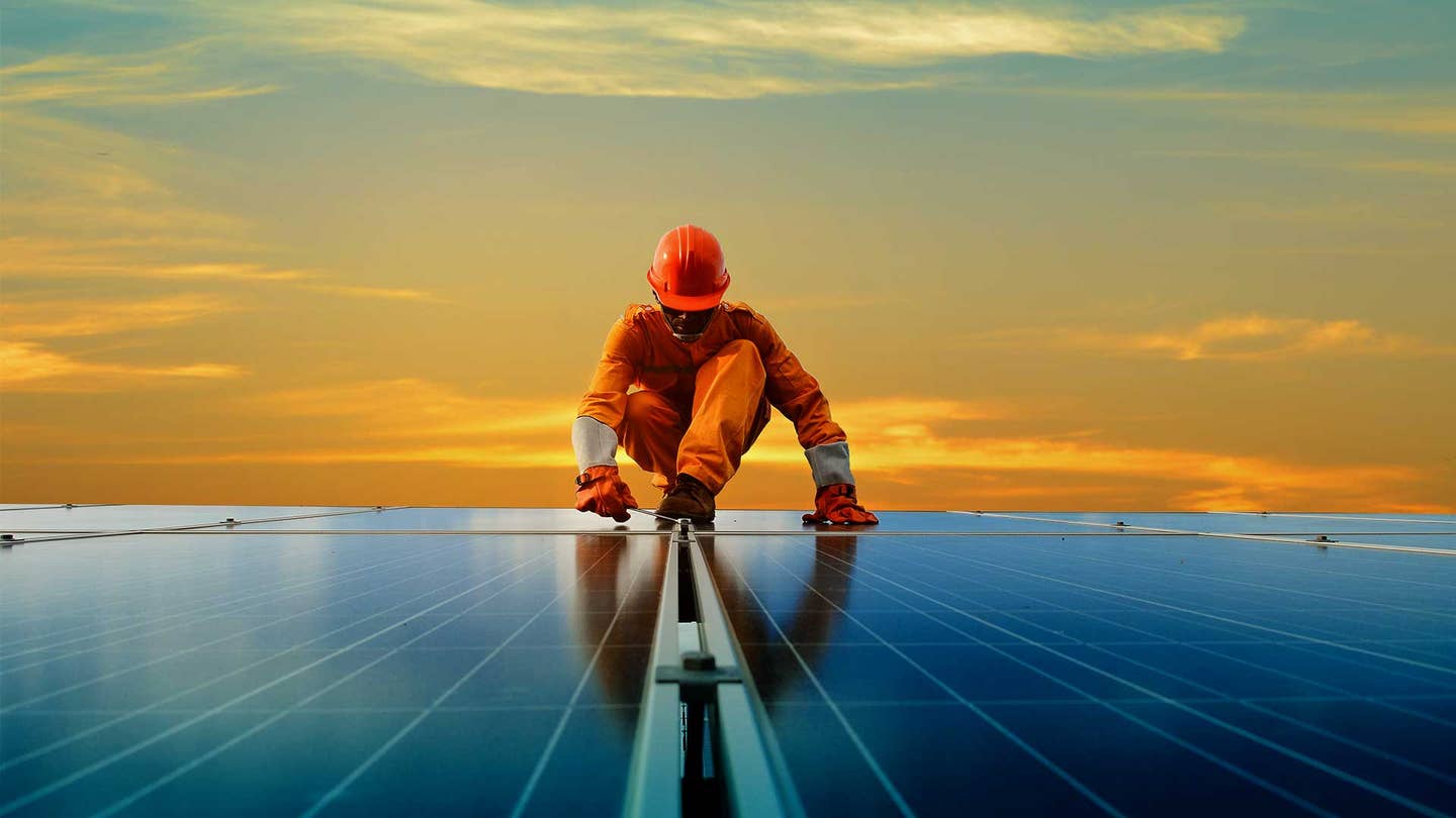 man working at solar power station
