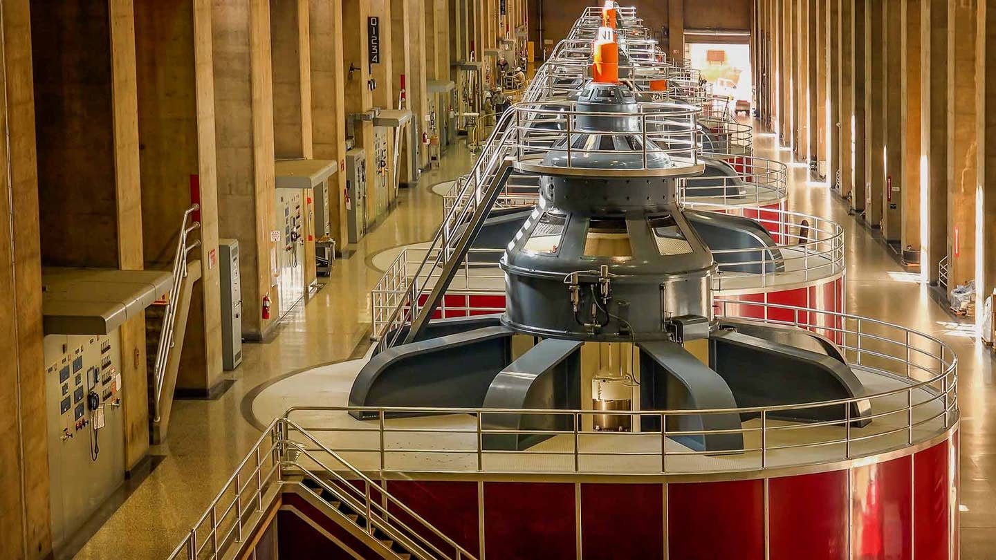 large turbines create electricity in power plant