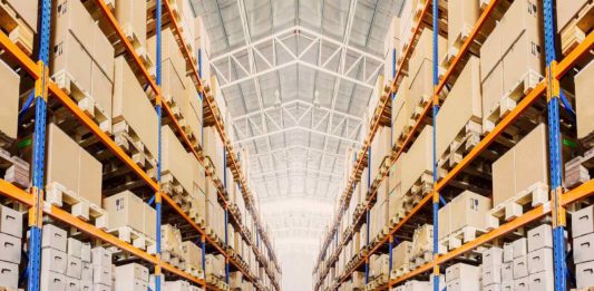 rows of shelves goods in boxes modern industry