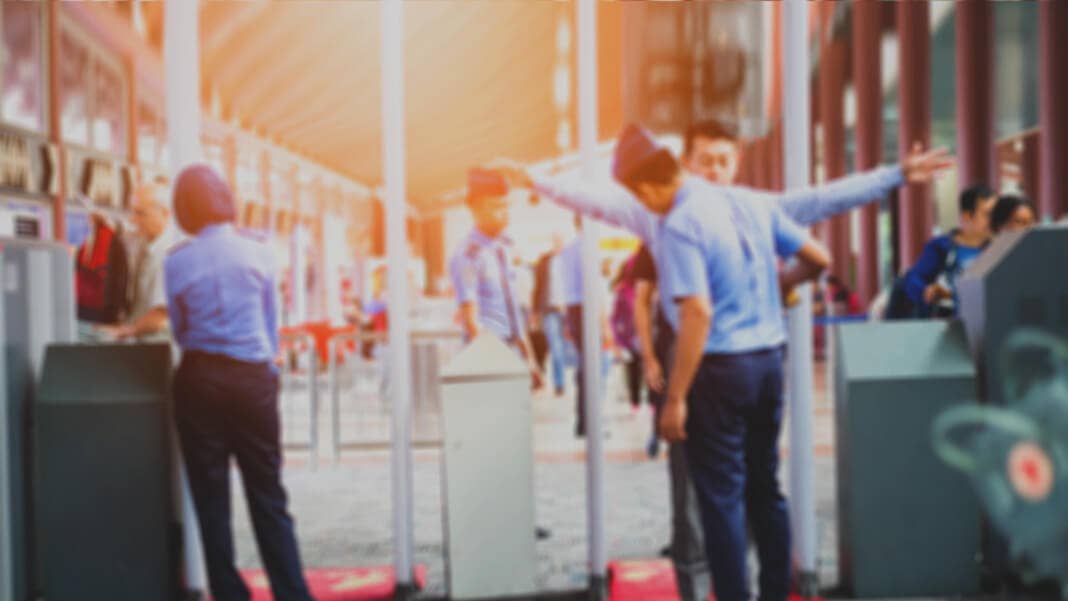 blurred airport security check gates