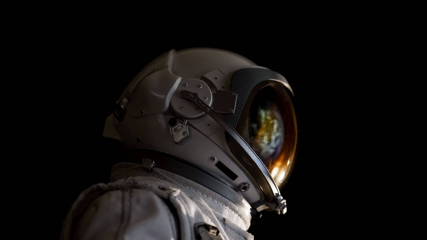 astronaut earth reflection