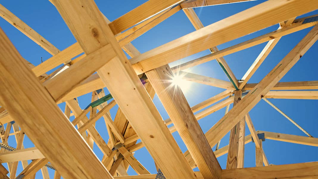 home framing with blue sky and sun background future of energy