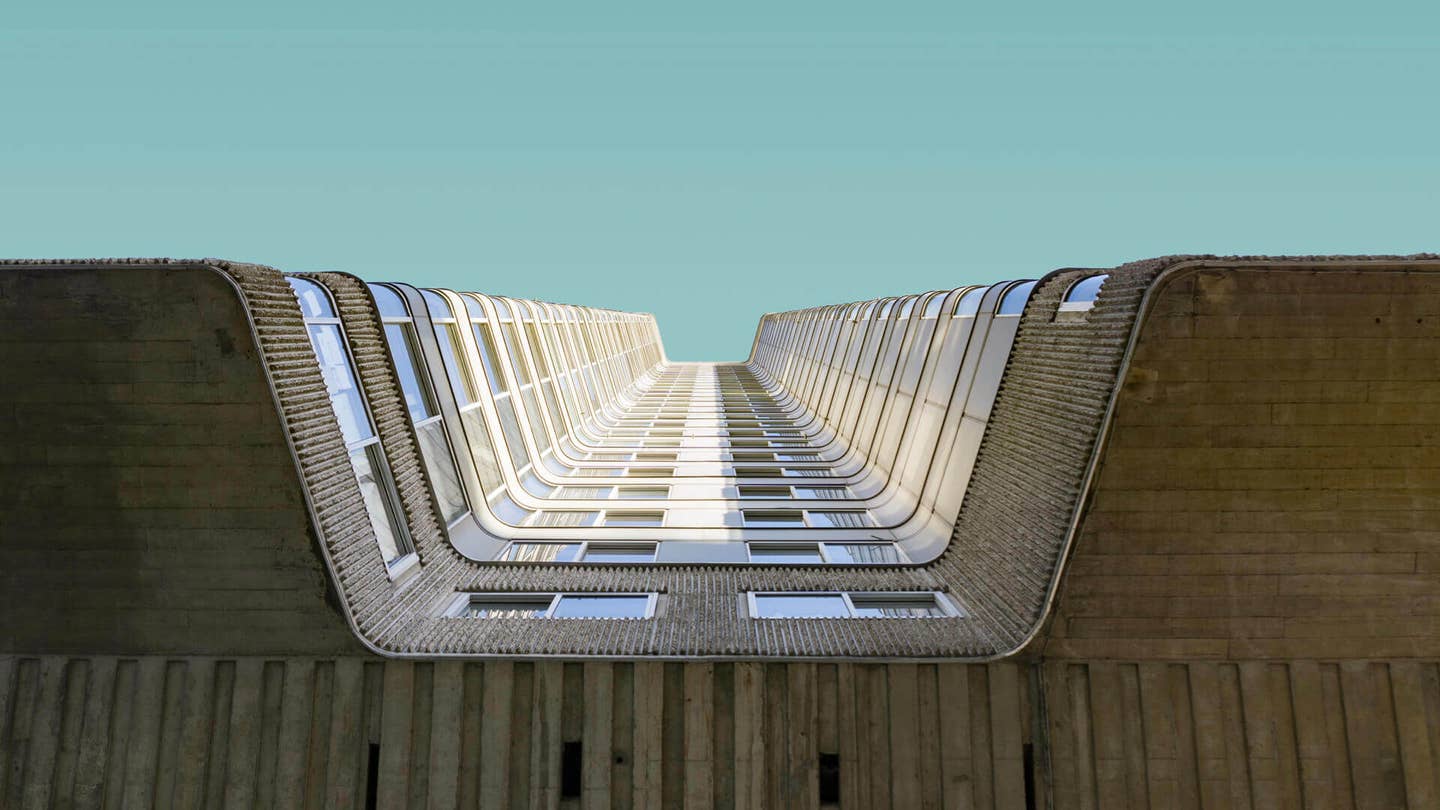 vanishing point perspective of building and blue sky