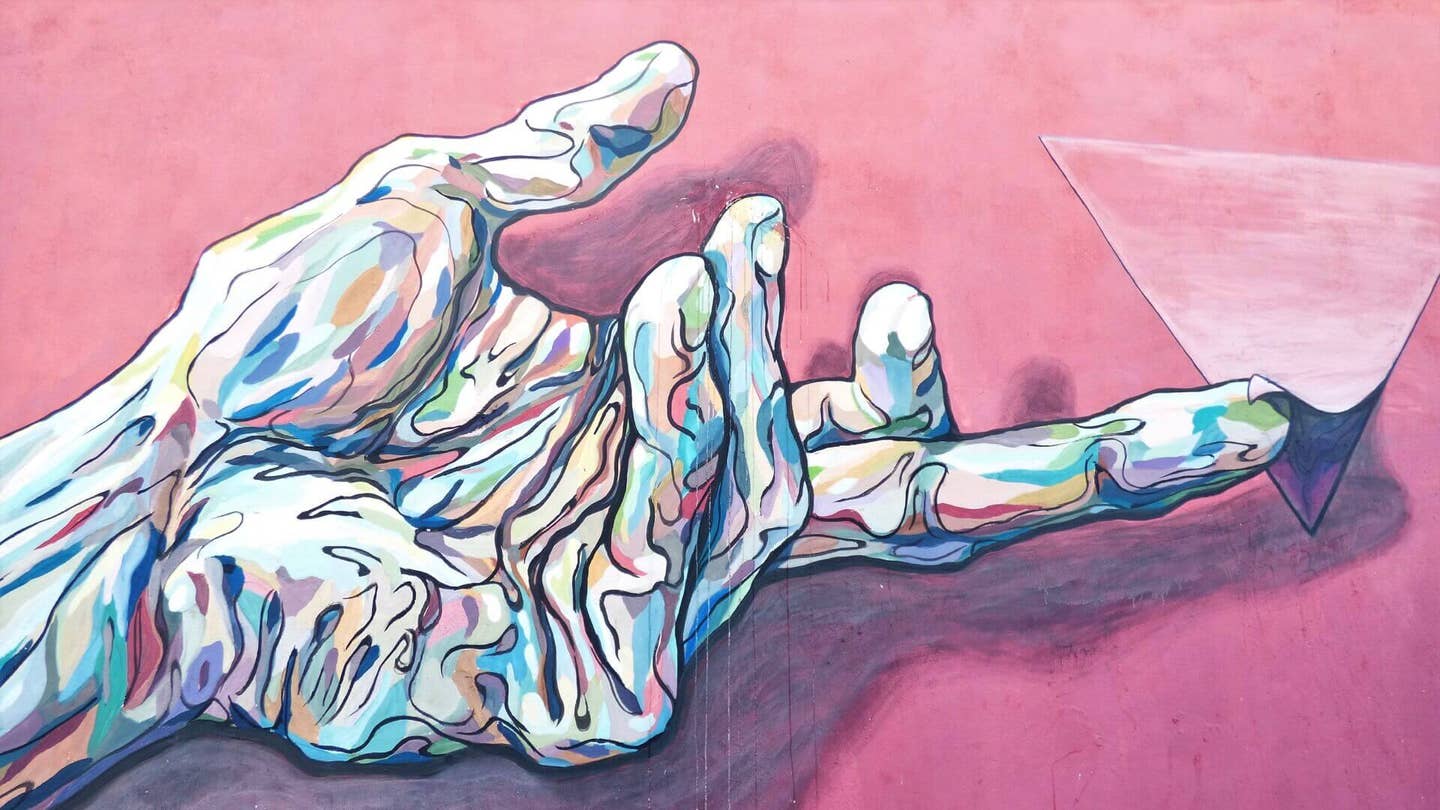 biotech synthetic biology multicolored hand pink background gustavo centurion