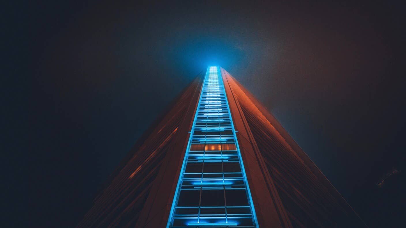 tech stories building blue red black glowing night vanishing point wes hicks