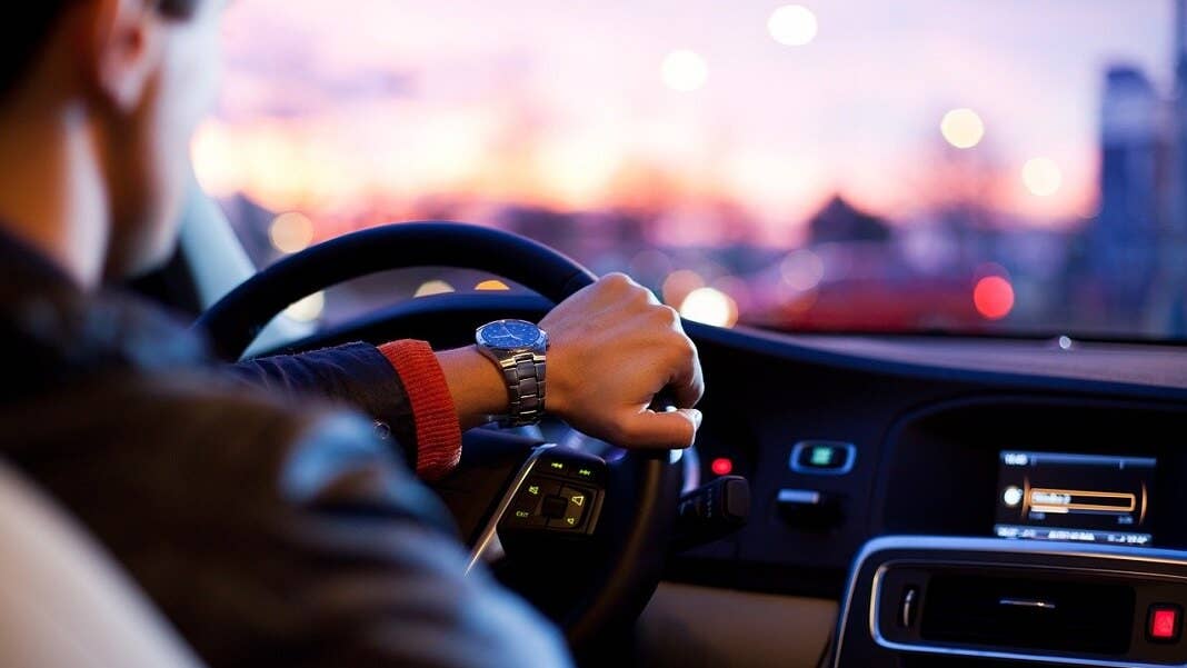 emotion-reading AI man driving car automotive AI