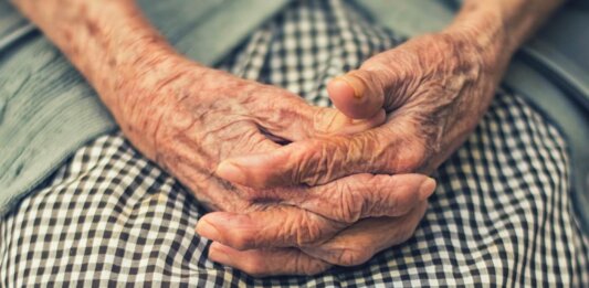 longevity genetics old hands black and white dress