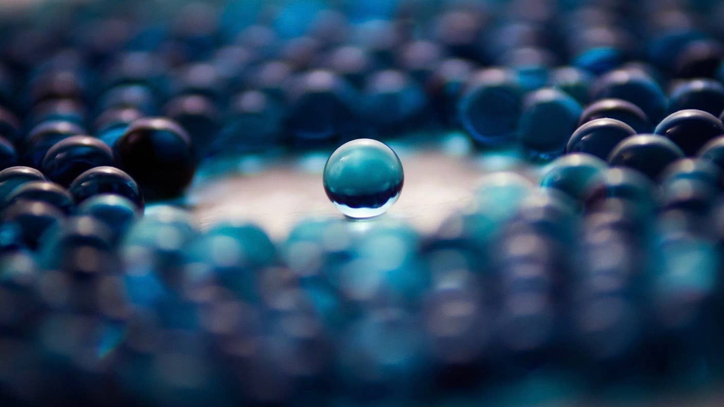 tech stories blue marbles one in middle