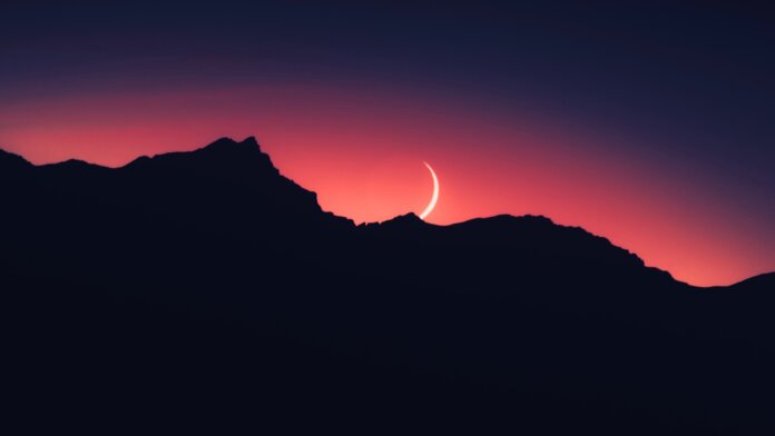 tech stories mountain sillhouettes fingernail crescent moon red sky