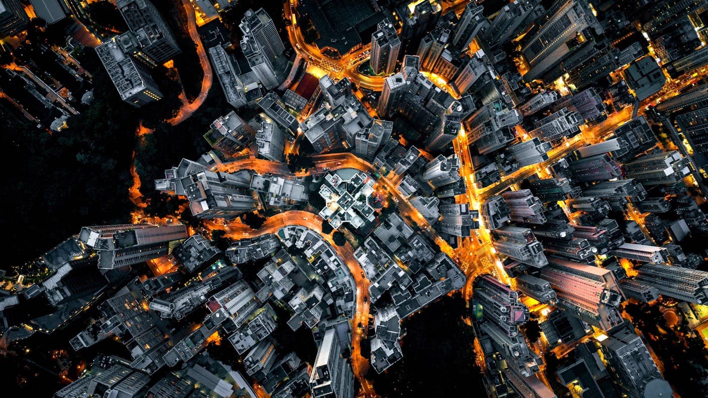 tech stories city skyline from above orange traffic streets