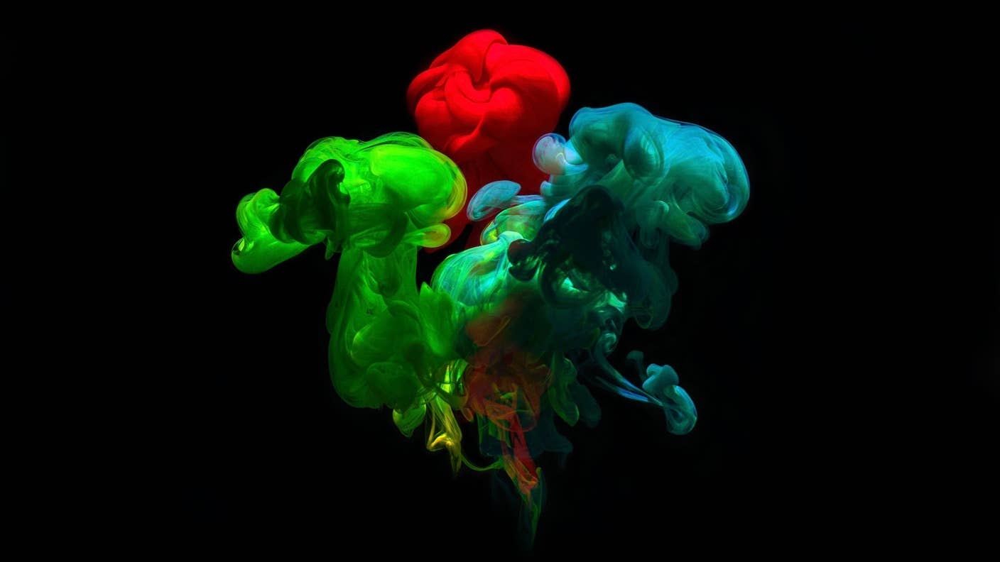 tech stories red blue green ink water black background