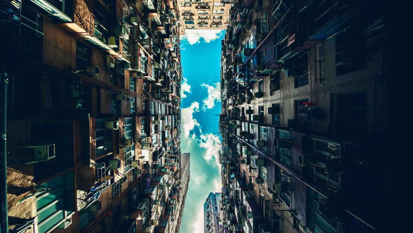 tech stories apartment building architecture city urban blue sky