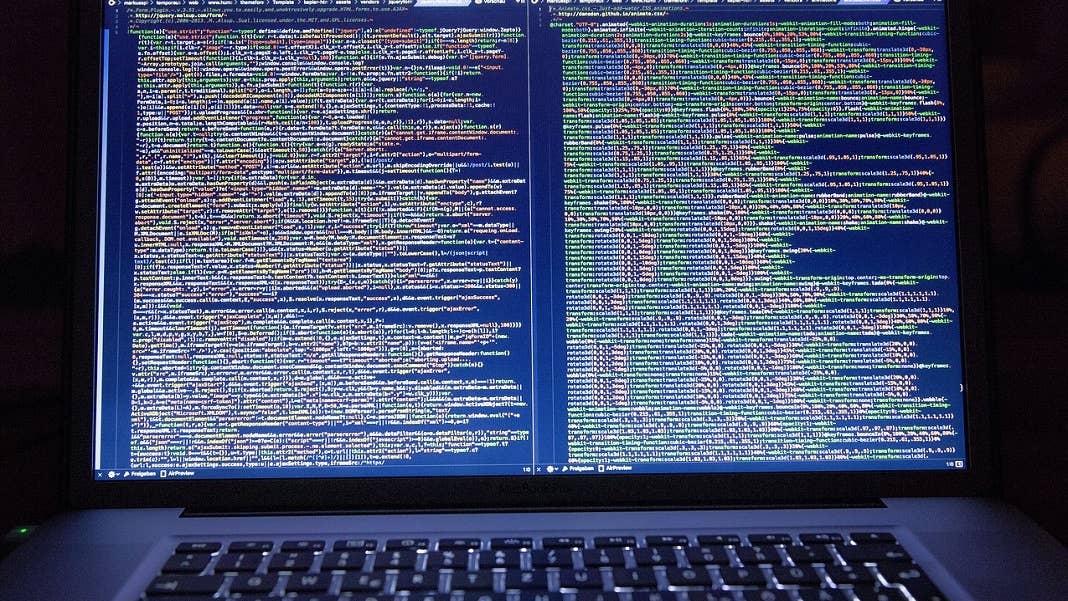 ethical hackers computer screen with code AI