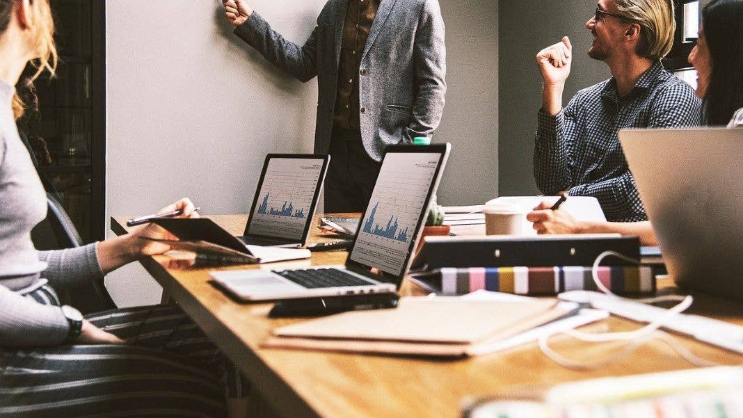 four-day work week future of work people in office