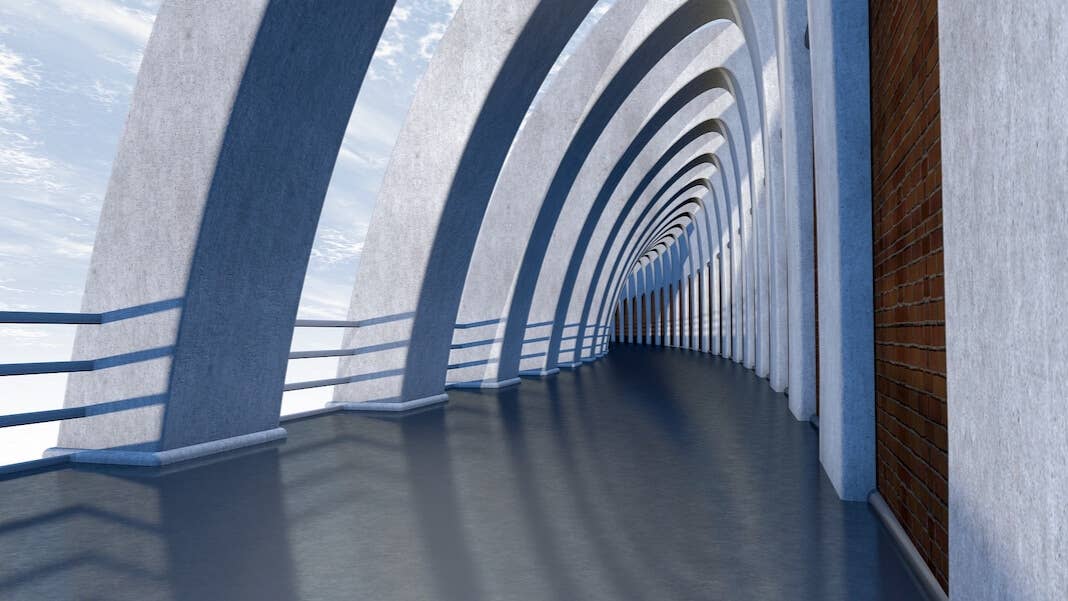 tech stories vanishing point walkway half arches blue sky brick