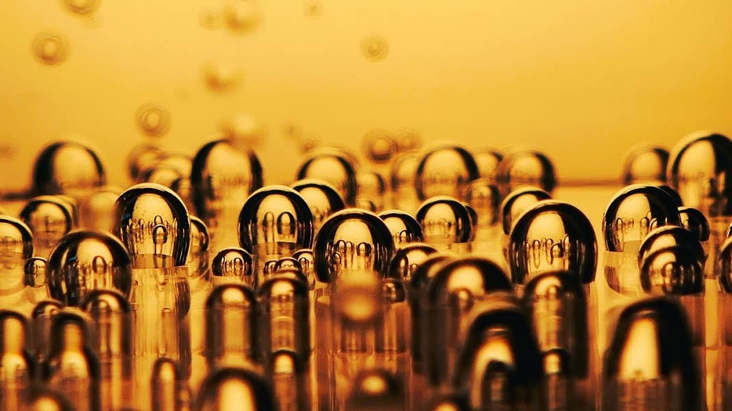 direct air capture CO2 test tubes with air bubbles golden