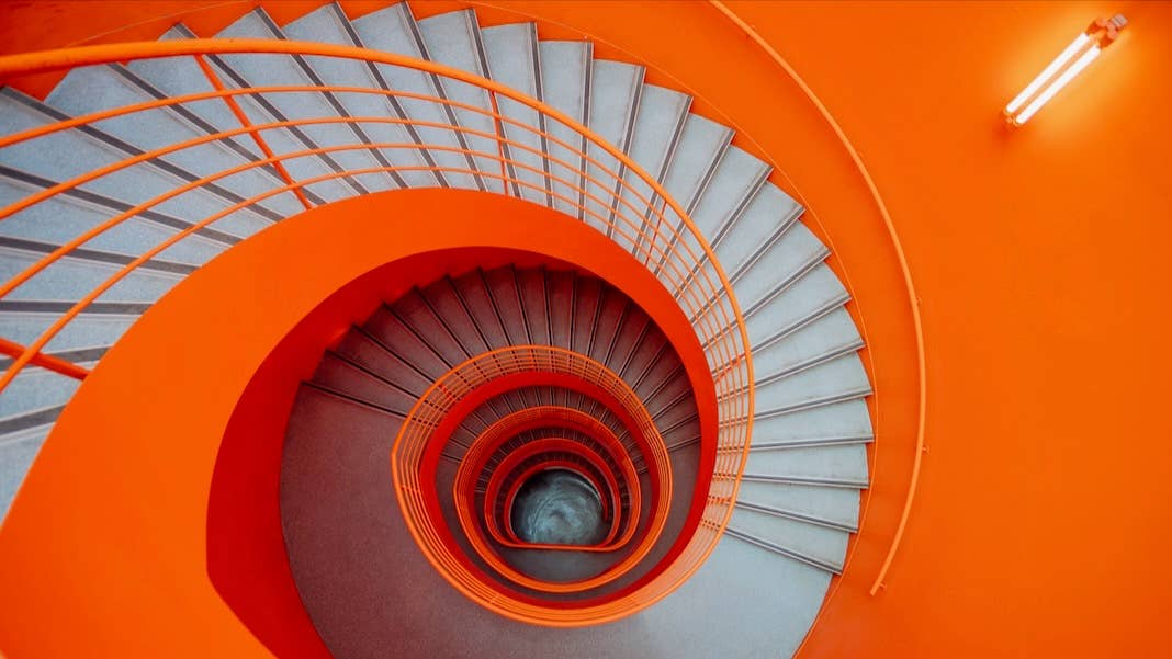 tech stories orange grey spiral stairs