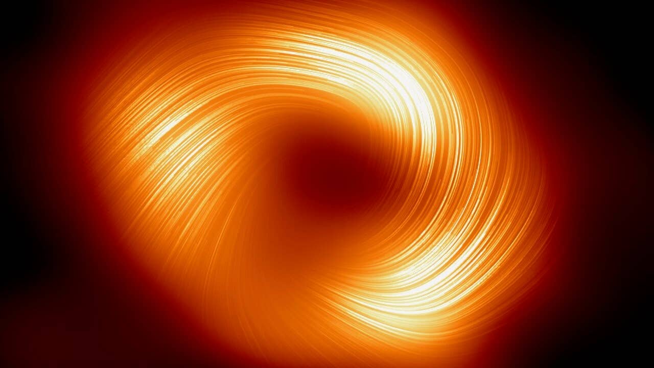 Polarized image of Sgr A* by the Event Horizon Telescope shows swirl of strong magnetic fields similar to neighboring supermassive black hole M87*.