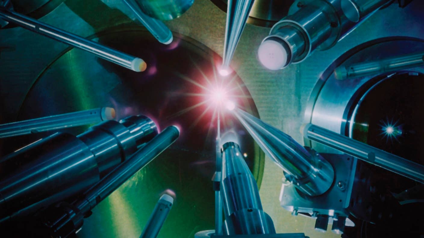 lasers converge on a pellet of fuel in a nuclear fusion reactor
