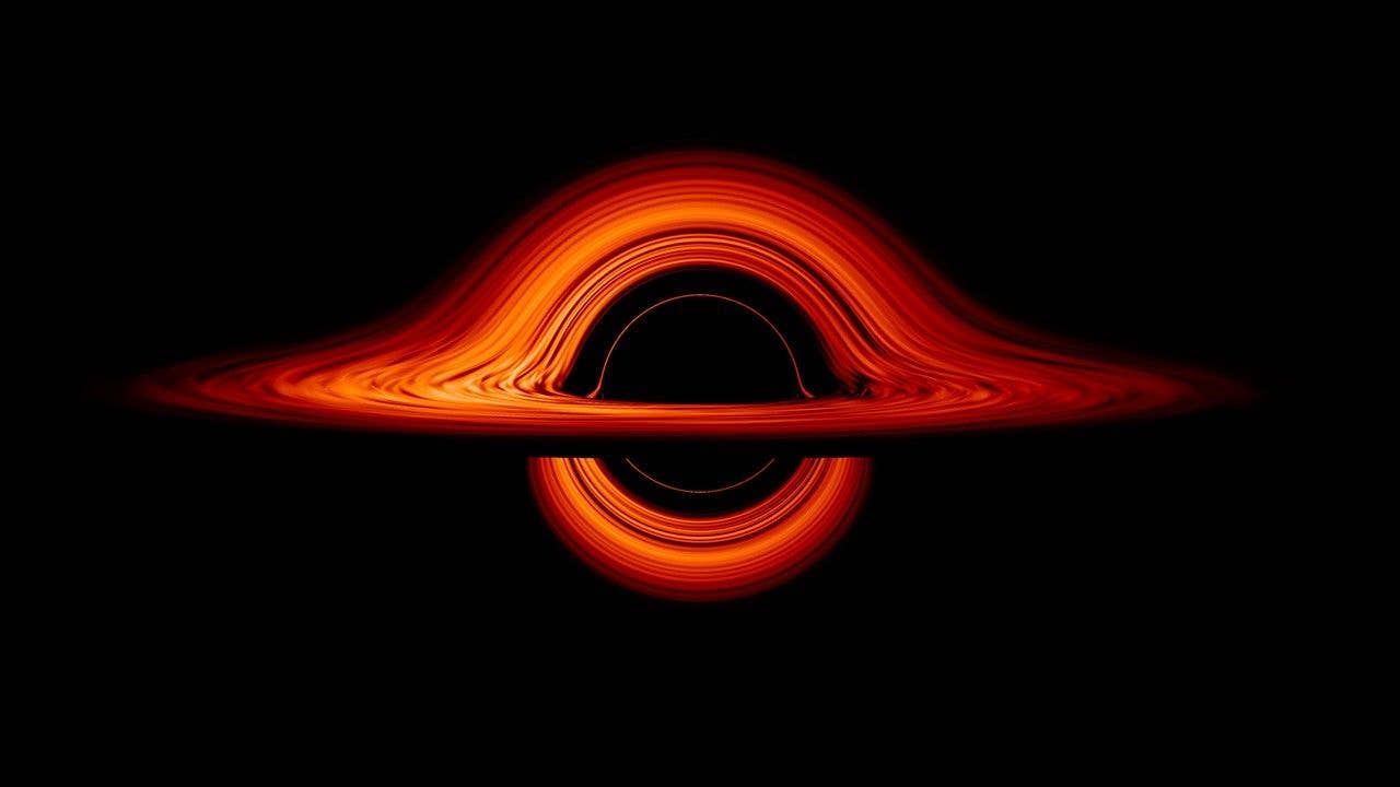 Visualization of a black hole with an accretion disk of infalling matter.