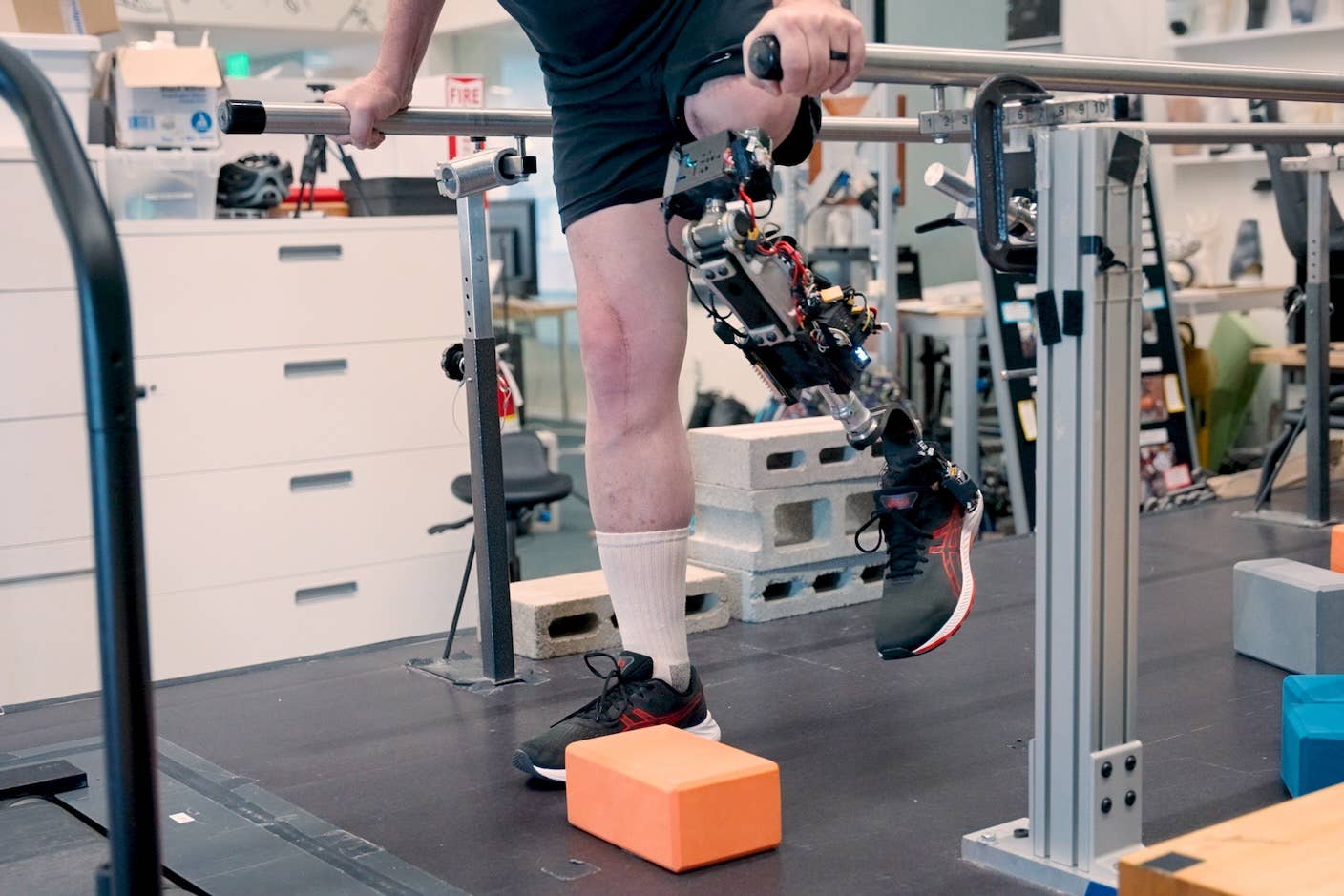 An amputee tests a new bionic leg with a knee