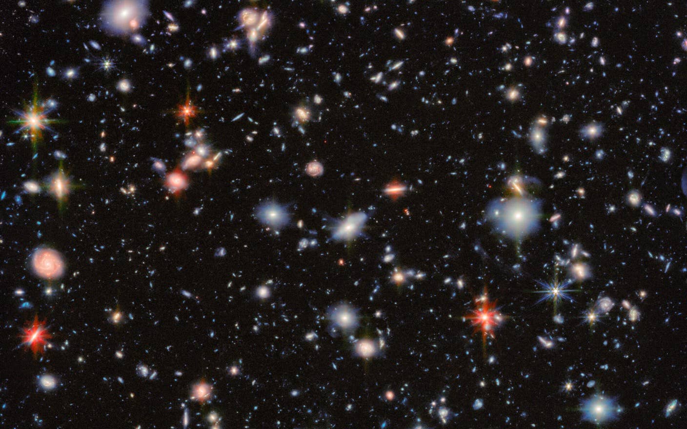 Information Could Be a Fundamental Part of the Universe—and May Explain Dark Energy and Dark Matter Thousands of galaxies glitter in this deep field image from the James Webb Space Telescope