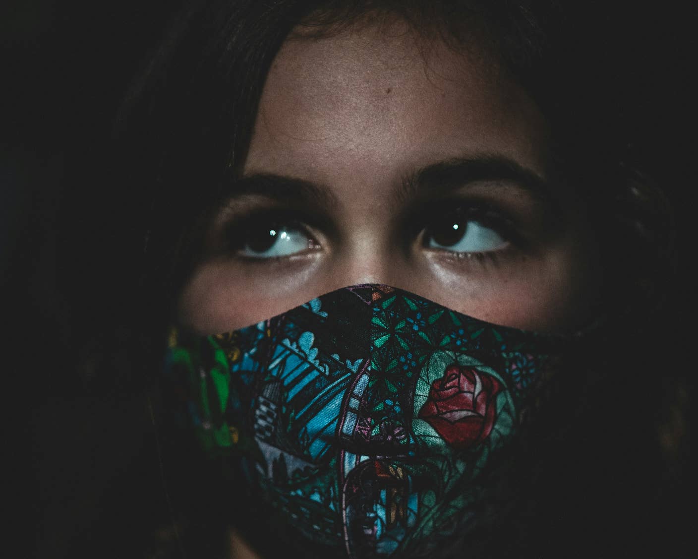 AI Can Now Design Proteins and DNA. Scientists Warn We Need Biosecurity Rules Before It’s Too Late. A girl wearing a mask over nose and mouth