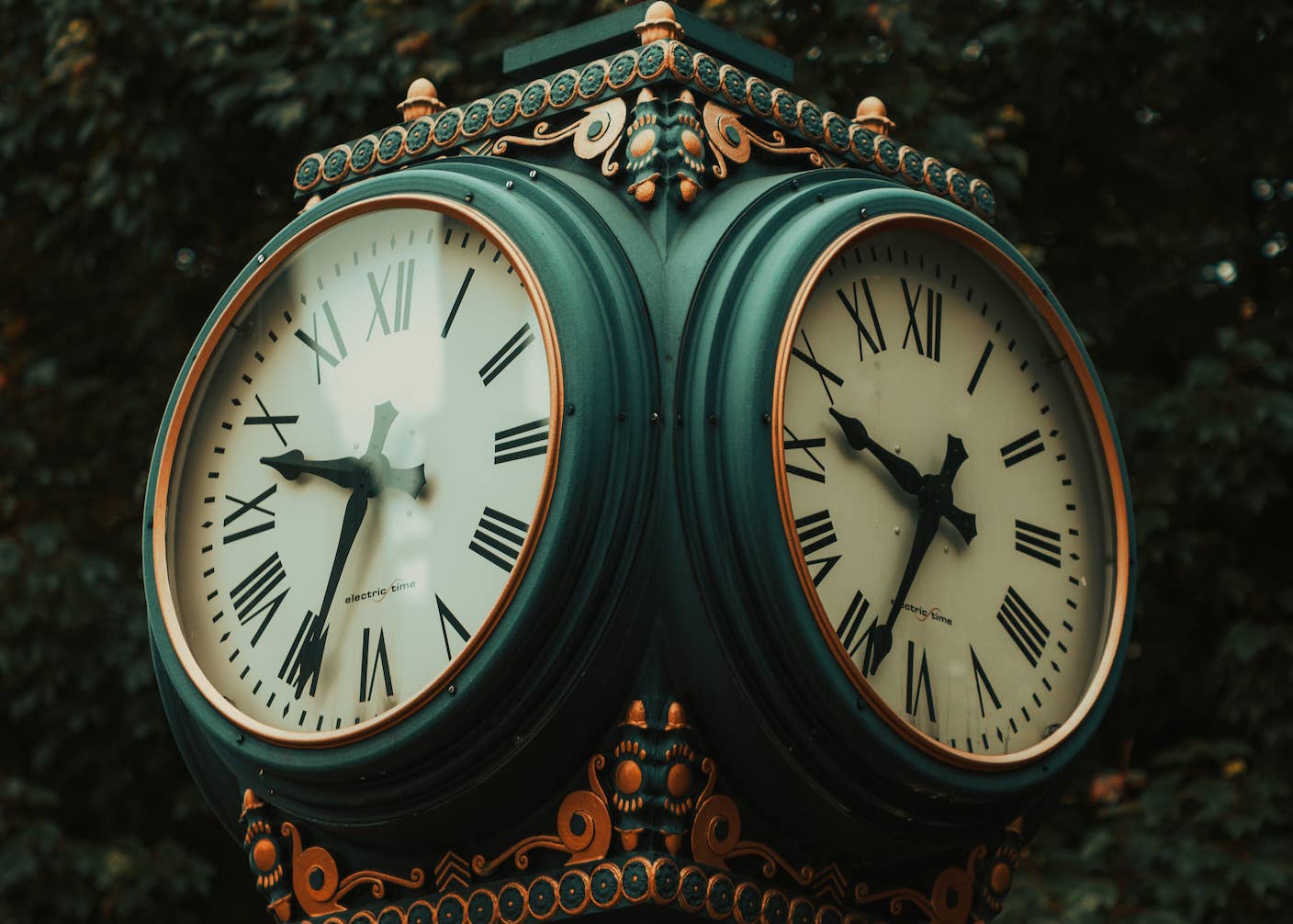 Is Time a Fundamental Part of Reality? A Quiet Revolution in Physics Suggests Not Two clocks with ornate green and gold styling