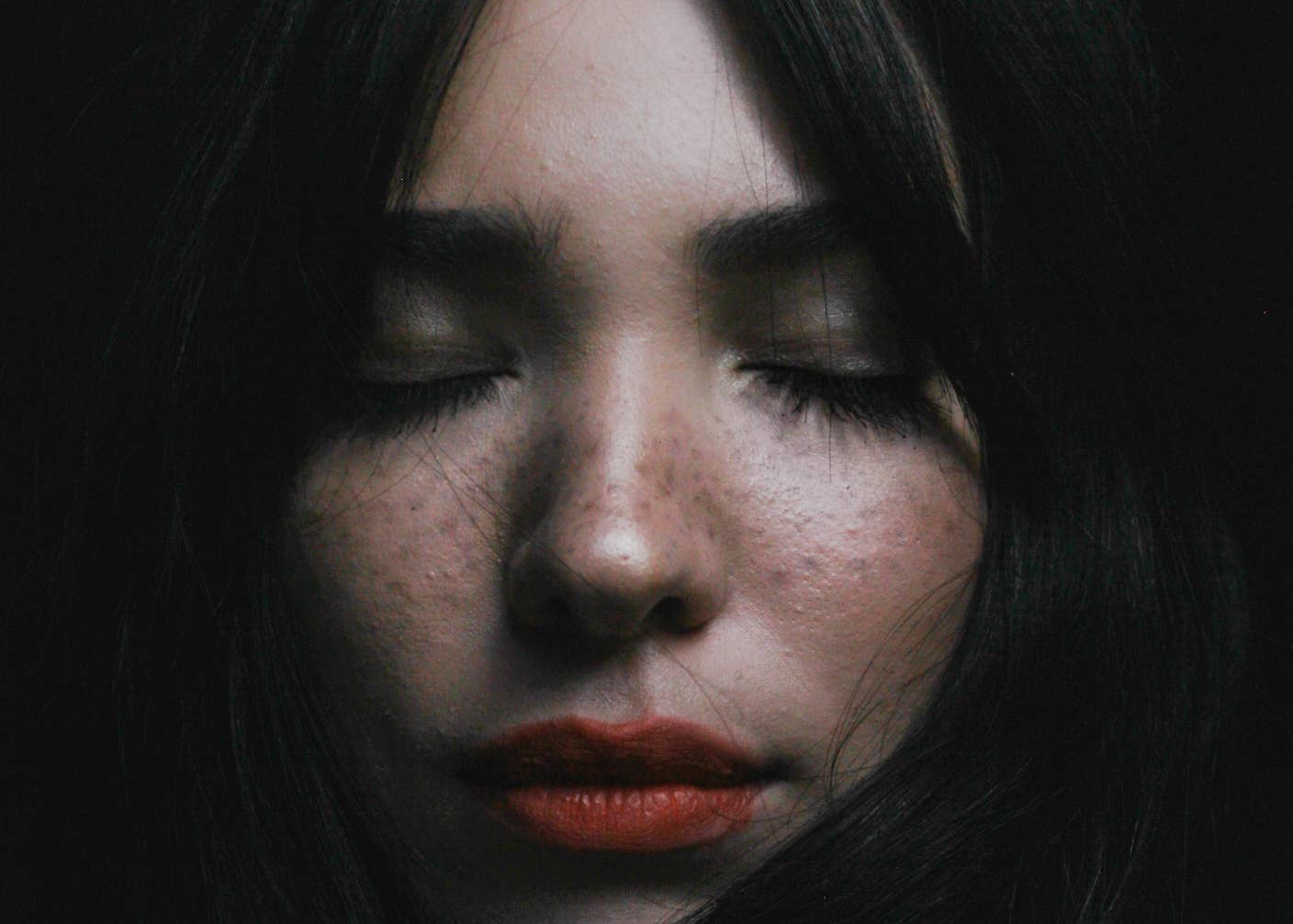 This Brain Pattern Could Signal the Moment Consciousness Slips Away A woman with her eyes closed