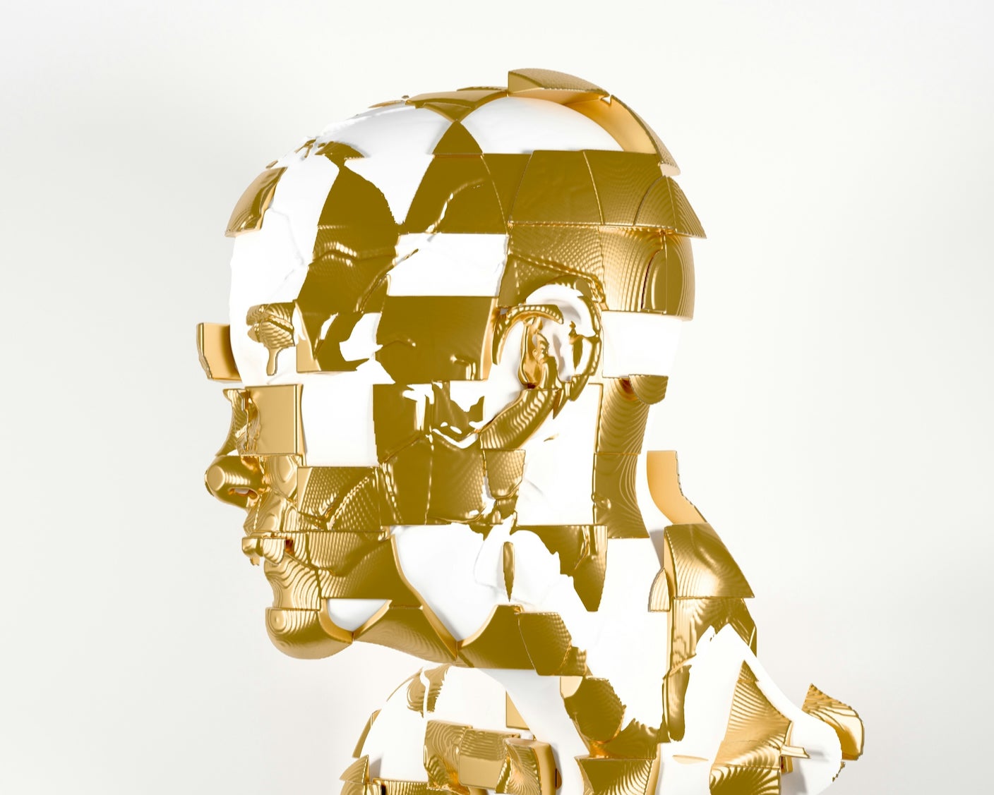 A broken gold bust of a person in profile