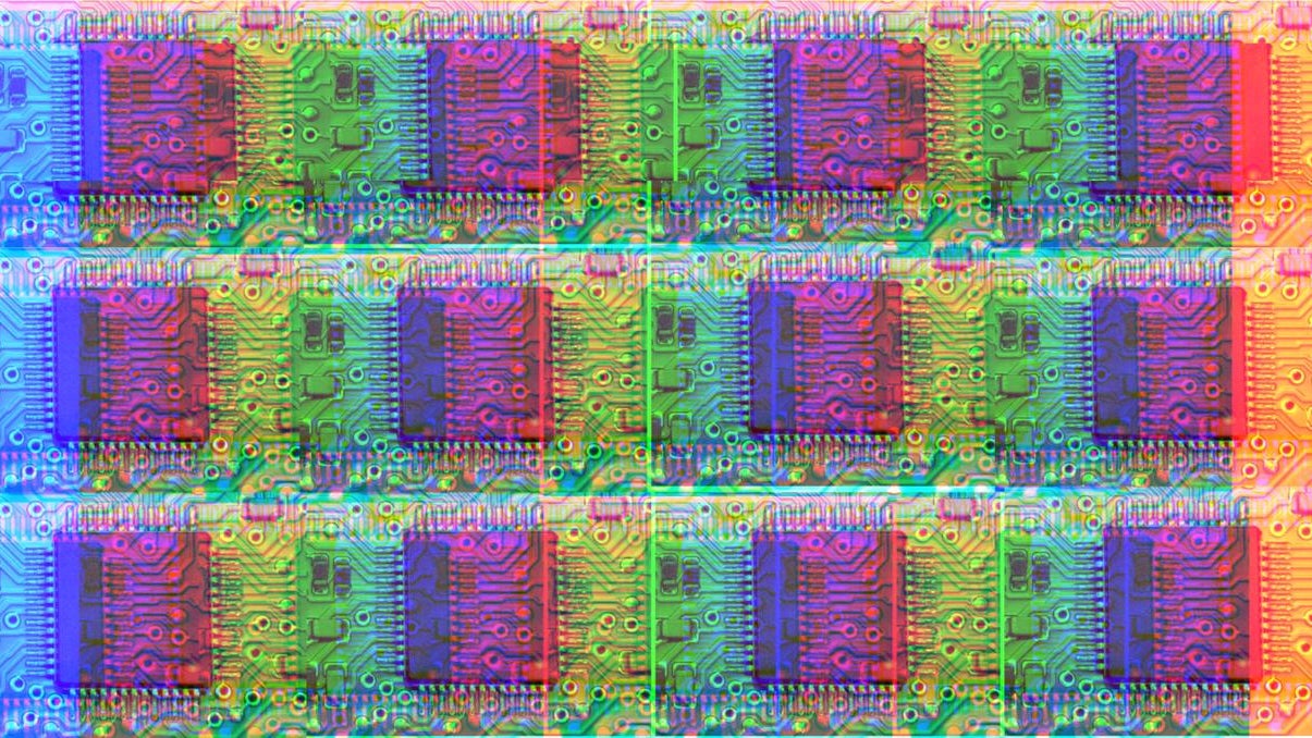A repeating pattern of a photograph of a silicon chip, recolored so that it is multi-colored, in the style of pop art.