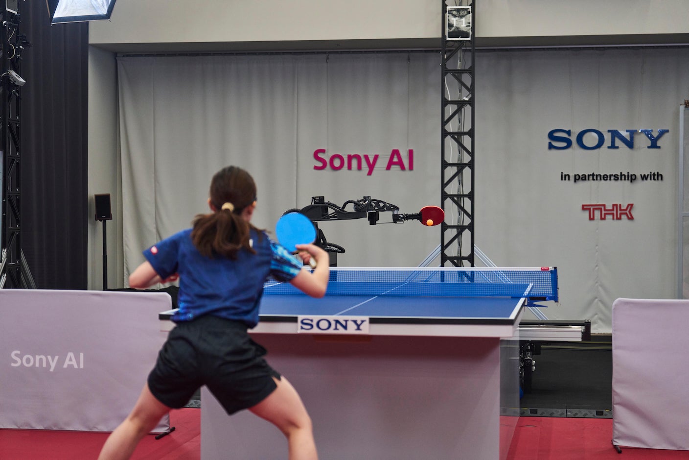 An elite table tennis player takes on Sony's ping-pong playing Ace robot.