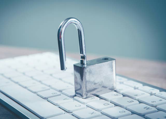 Anthropic’s Mythos AI Uncovered Serious Security Holes in Every Major OS and Browser A silver padlock sits on a computer keyboard unlocked