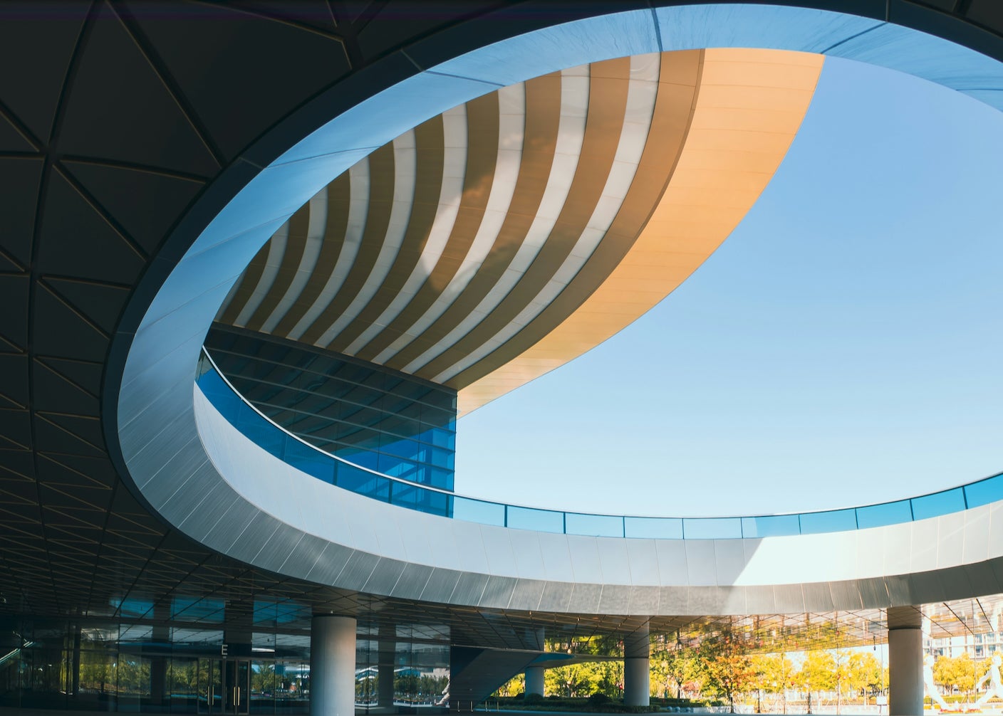 Curving open atrium and blue sky