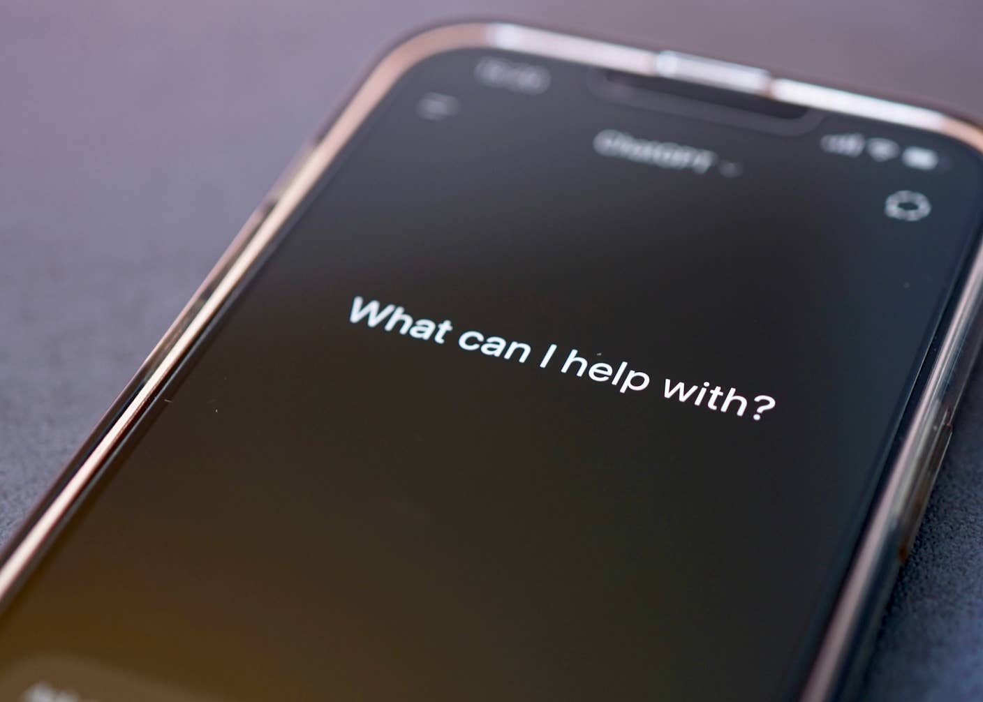 You Probably Wouldn’t Notice if a Chatbot Slipped Ads Into Its Responses A smartphone with the message "What can I help you with" on its display