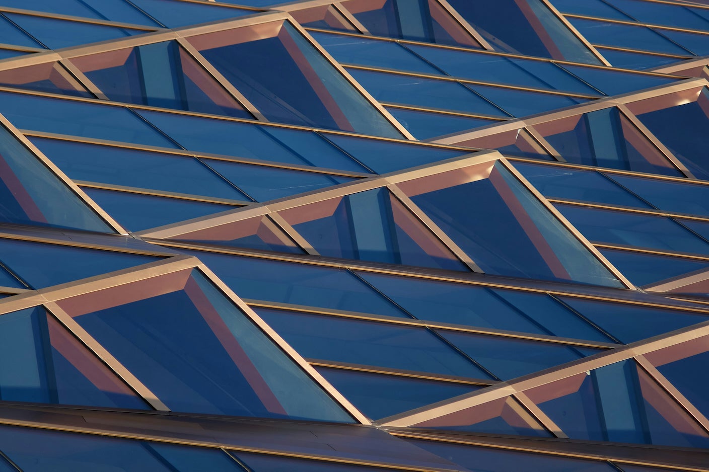Architectural windows triangular blue and bronze