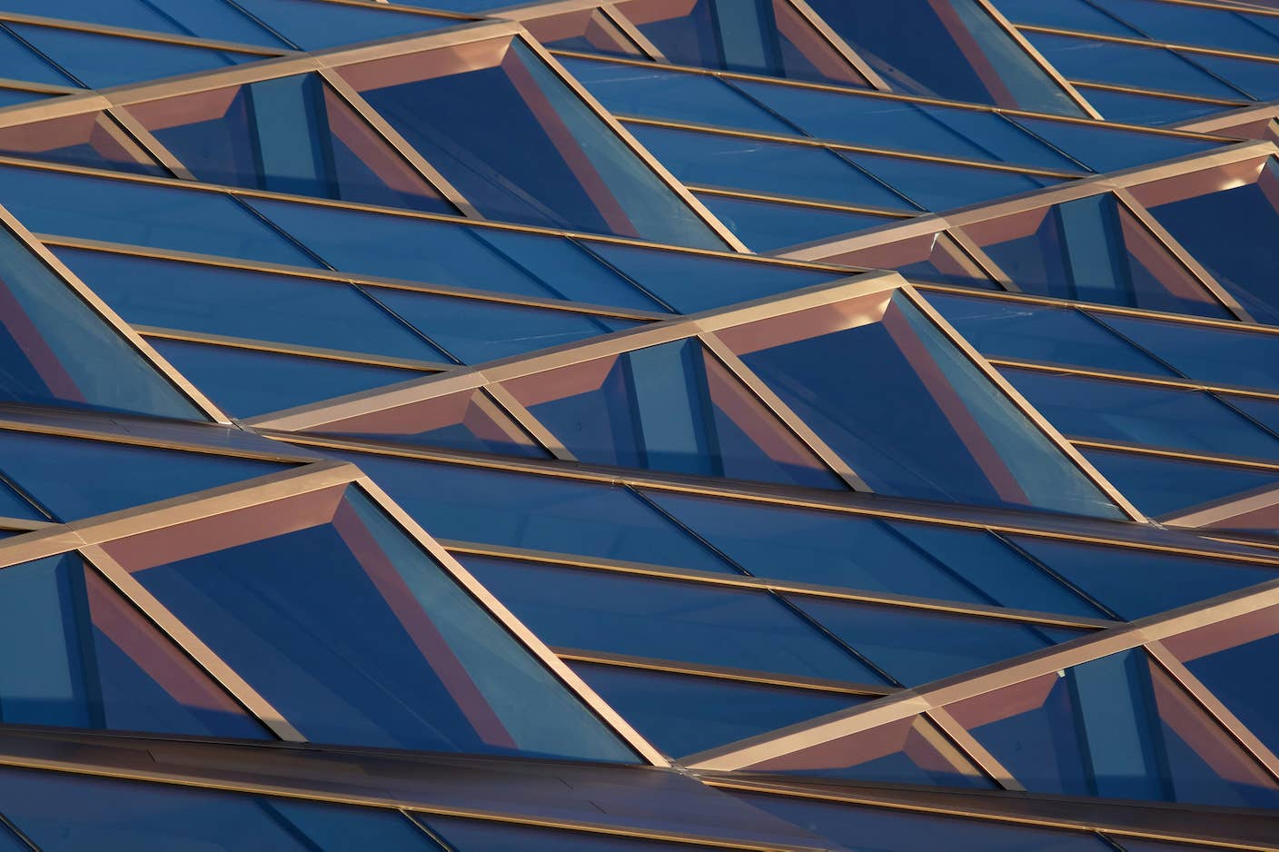This Week’s Awesome Tech Stories From Around the Web (Through June 13) Architectural windows triangular blue and bronze