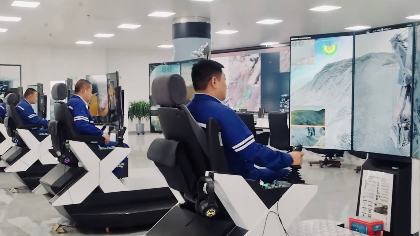 Companies Could Soon Staff ‘Stubbornly Local’ Jobs With Workers 4,000 Miles Away A line of workers at video-game-like terminals