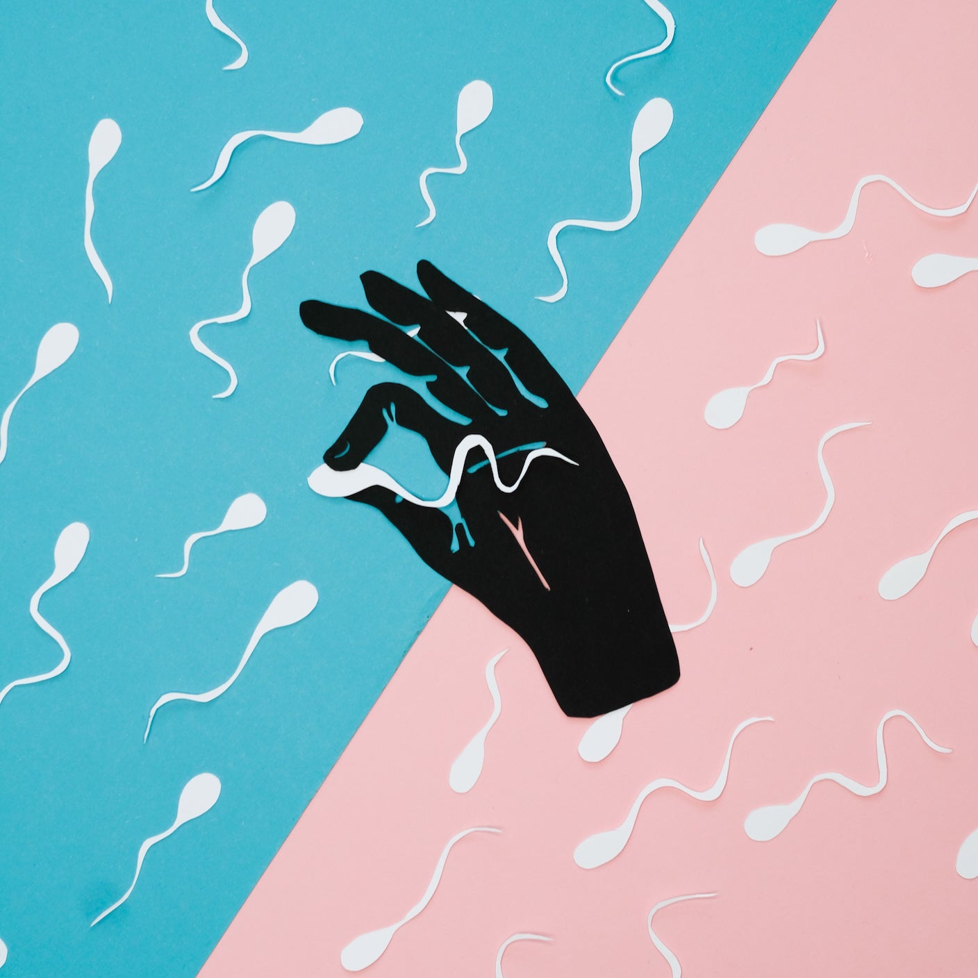 A human hand and a sperm signifying scientific efforts to grow sperm in the lab