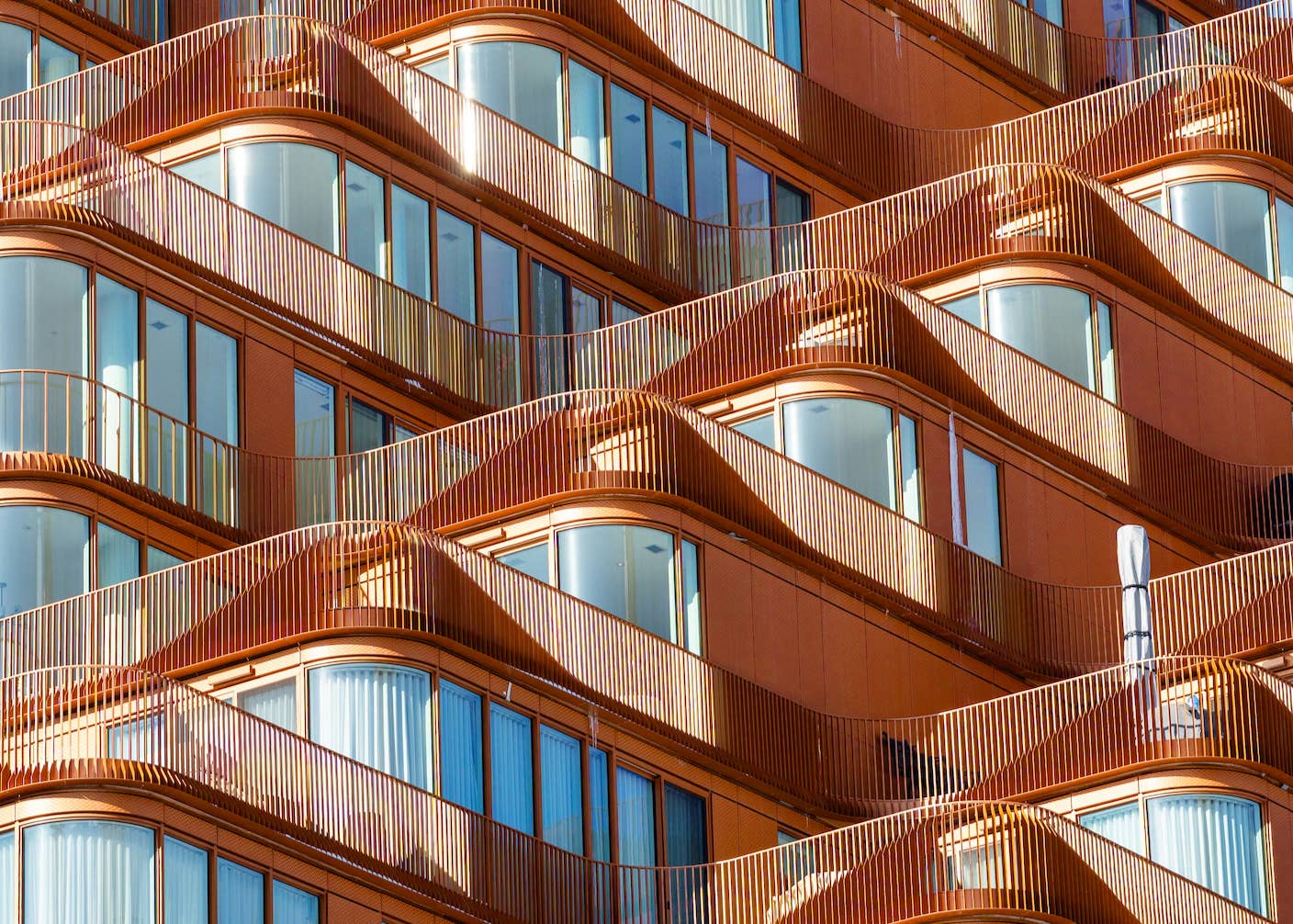 This Week’s Awesome Tech Stories From Around the Web (Through September 12) Architectural repetition, bronze balconies and blue windows.