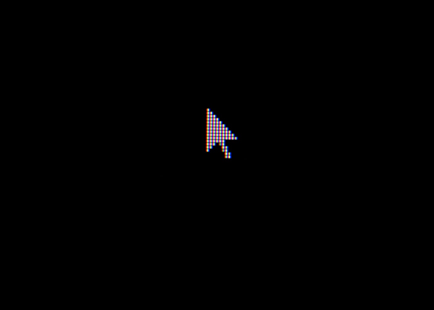 White cursor arrow on a blank black screen