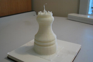 An unfinished 3D printed rook.