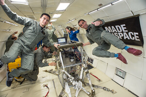Made In Space cofounders testing their tech in simulated microgravity.