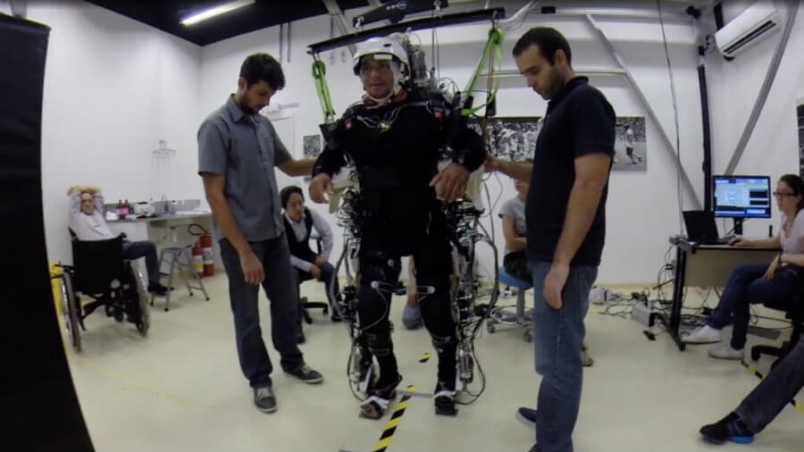 Paralyzed-man-moving-body-mind-controlled-exoskeleton