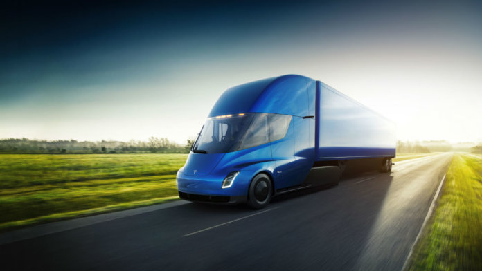 Tesla-Semi-driving-front-blue