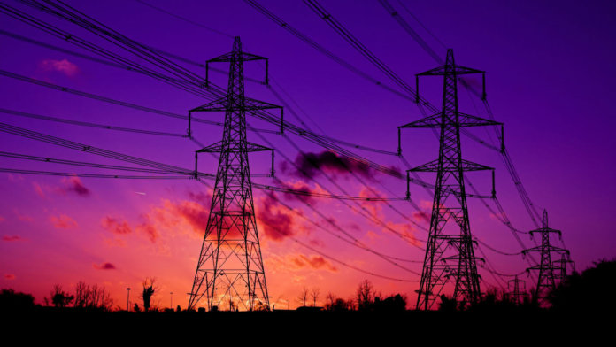 free-endless-energy-pylon-towers-during-fiery-sunset