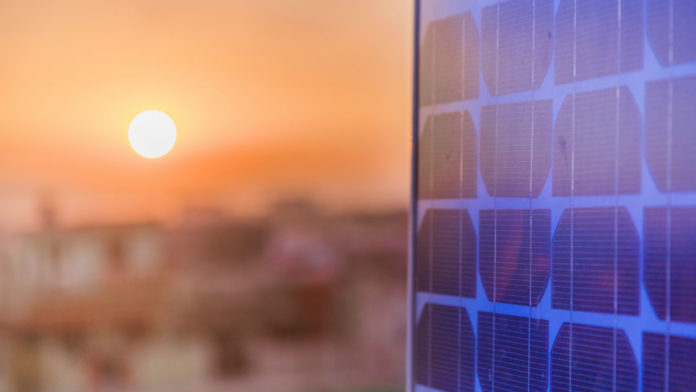 big-tech-climate-change-sunset-solar-panel