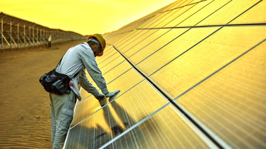 Engineer-solar-photovoltaic_shutterstock_701298904 - Singularity Hub